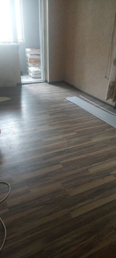 Taxta teksturalı laminat döşəmə - Rəng: tünd-qəhvəyi və açıq-qəhvəyi lalafo.az -da Taxta teksturalı laminat döşəmə - Rəng: tünd-qəhvəyi və açıq-qəhvəyi