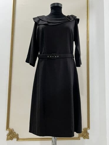 Qara rəngli, diz boyu xanım donu. - Klassik A-kəsim siluet - 3/4 lalafo.az -da Qara rəngli, diz boyu xanım donu. - Klassik A-kəsim siluet - 3/4