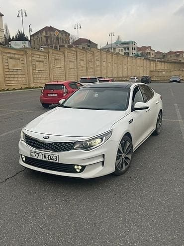Ağ rəngdə, qara damı olan Kia Optima avtomobili. Maşın rahatlığı və lalafo.az -da Ağ rəngdə, qara damı olan Kia Optima avtomobili. Maşın rahatlığı və