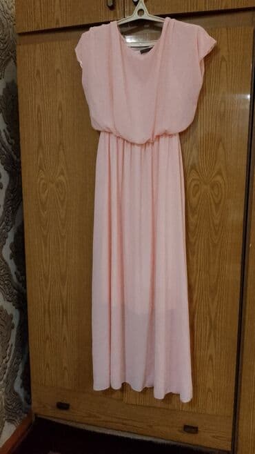 Zərif açıq çəhrayı rəngdə uzun qadın donu. - Model: Maxi uzunluq, bel lalafo.az -da Zərif açıq çəhrayı rəngdə uzun qadın donu. - Model: Maxi uzunluq, bel