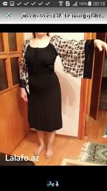 Qadın paltarı – qara rəngdə, dizə qədər uzunluqda model. - Üst hissə lalafo.az -da Qadın paltarı – qara rəngdə, dizə qədər uzunluqda model. - Üst hissə