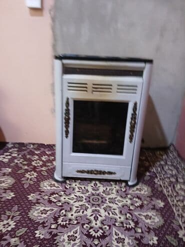 Dekorativ odun sobası / kamin tipli isitmə qurğusu - Ön hissəsi lalafo.az -da Dekorativ odun sobası / kamin tipli isitmə qurğusu - Ön hissəsi