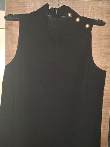 Qara rəngdə, qolsuz, düz kəsimli tunik/mini don. Yüksək yaxalı dizayn lalafo.az -da Qara rəngdə, qolsuz, düz kəsimli tunik/mini don. Yüksək yaxalı dizayn