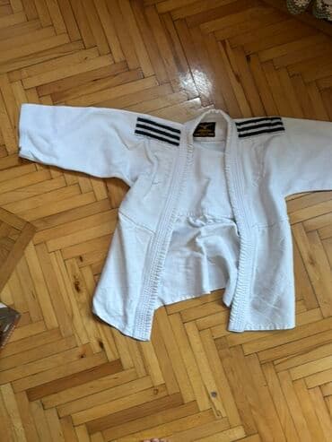 Ağ rəngli döyüş sənəti gödəkçəsi (gi/judo üstü) - Material: qalın lalafo.az -da Ağ rəngli döyüş sənəti gödəkçəsi (gi/judo üstü) - Material: qalın