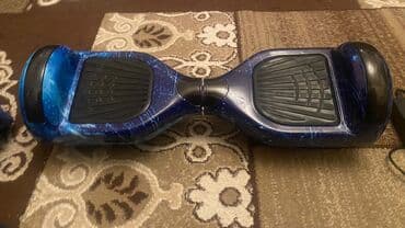 Hovərbord (self-balans skuter) - Rəng/örtük: kosmos temalı mavi lalafo.az -da Hovərbord (self-balans skuter) - Rəng/örtük: kosmos temalı mavi