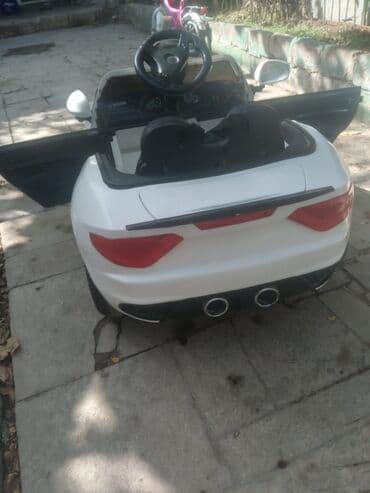 Uşaq üçün elektrikli mini avtomobil – ağ rəng, kabriolet kupe dizaynı lalafo.az -da Uşaq üçün elektrikli mini avtomobil – ağ rəng, kabriolet kupe dizaynı