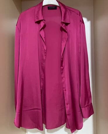 Zərif çəhrayı rəngdə, uzunqol qadın bluzu. Bluzun kəsimi sərbəstdir və lalafo.az -da Zərif çəhrayı rəngdə, uzunqol qadın bluzu. Bluzun kəsimi sərbəstdir və