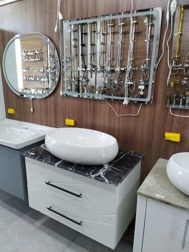 Mərmər formalı qara rəngli üst səthə malik bu hamam dolabı oval lalafo.az -da Mərmər formalı qara rəngli üst səthə malik bu hamam dolabı oval