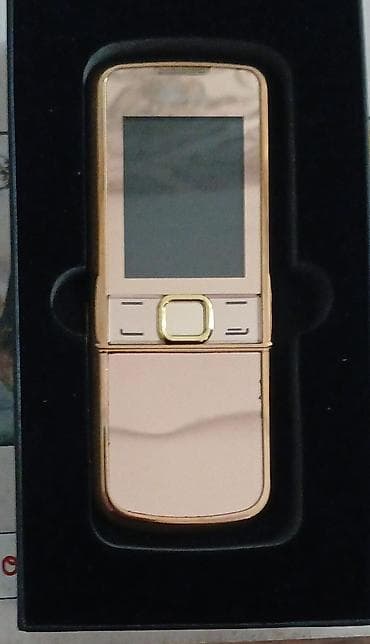 Qızılı slayder düyməli telefon - Korpus: parlaq qızılı rəngdə at lalafo.az Qızılı slayder düyməli telefon - Korpus: parlaq qızılı rəngdə