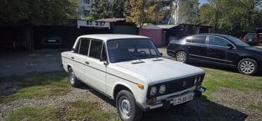Ağ rəngli VAZ-2106 sedan avtomobili. Dörd qapılı bu avtomobil retro lalafo.az -da Ağ rəngli VAZ-2106 sedan avtomobili. Dörd qapılı bu avtomobil retro