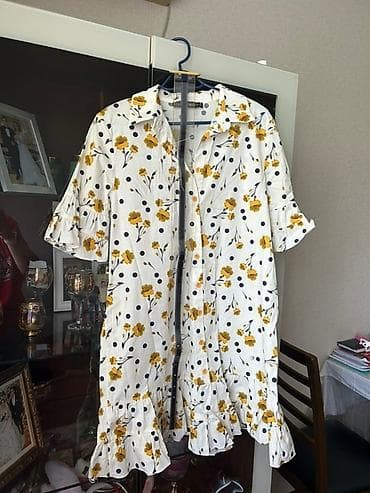 Ladyform markalı, ağ rəngdə, sarı çiçək və qara nöqtəli dizaynlı, qısa at lalafo.az Ladyform markalı, ağ rəngdə, sarı çiçək və qara nöqtəli dizaynlı, qısa