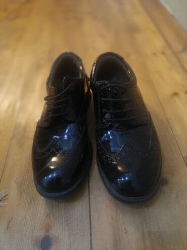 Parlaq qara klassik ayaqqabı - Model: broq üslubunda, ucluq və lalafo.az -da Parlaq qara klassik ayaqqabı - Model: broq üslubunda, ucluq və