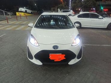 Toyota Aqua Hybrid – ağ rəngli, 5 qapılı şəhər hetçbeki lalafo.az -da Toyota Aqua Hybrid – ağ rəngli, 5 qapılı şəhər hetçbeki