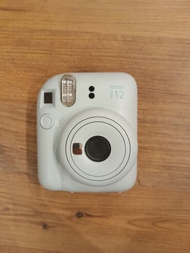 Fujifilm Instax Mini 12. istifadə olunmayıb. - Rəng: Açıq mint lalafo.az -da Fujifilm Instax Mini 12. istifadə olunmayıb. - Rəng: Açıq mint