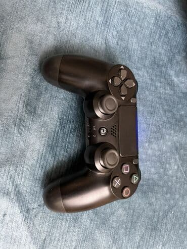 PlayStation 4 DualShock 4 simsiz oyun idarəetməsi - Rəng: qara - lalafo.az -da PlayStation 4 DualShock 4 simsiz oyun idarəetməsi - Rəng: qara -