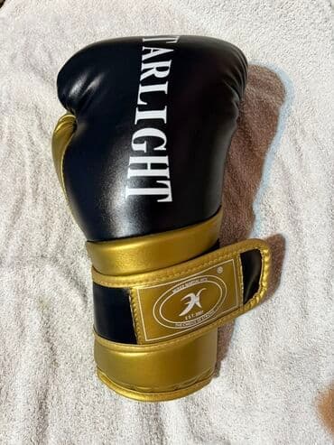 Boks əlcəyi – ST★RLIGHT dizaynı - Rəng: qara-qızılı - Material lalafo.az -da Boks əlcəyi – ST★RLIGHT dizaynı - Rəng: qara-qızılı - Material