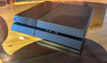 PlayStation 4 (PS4) oyun konsolu 2 ədəd DualShock 4 gamepad ustundedi lalafo.az -da PlayStation 4 (PS4) oyun konsolu 2 ədəd DualShock 4 gamepad ustundedi