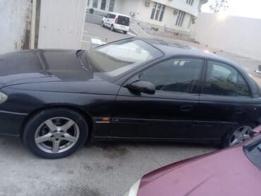 Opel Omega B sedan - Kuzov: 4 qapılı sedan, qara rəng - Mühərrik lalafo.az -da Opel Omega B sedan - Kuzov: 4 qapılı sedan, qara rəng - Mühərrik