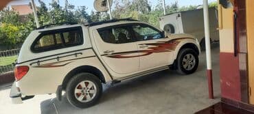 Mitsubishi L200 pikap - Gövdə: ağ rəng, ikiturbo kimi dekorativ lalafo.az -da Mitsubishi L200 pikap - Gövdə: ağ rəng, ikiturbo kimi dekorativ
