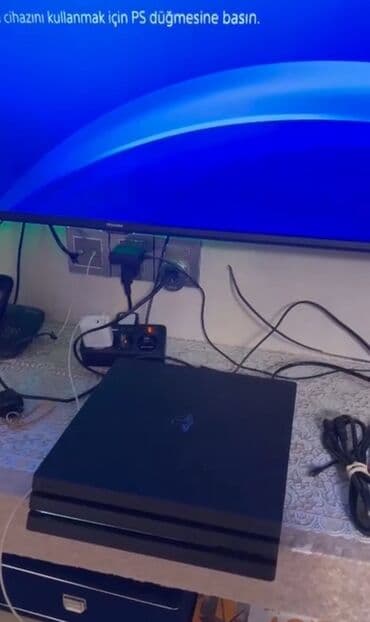 PlayStation 4 Pro oyun konsolu iki original pult icinde 10 dene oyun lalafo.az -da PlayStation 4 Pro oyun konsolu iki original pult icinde 10 dene oyun