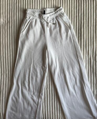 Ağ rəngli rahat şalvar – gündəlik və idman tərzi üçün. - Model: geniş lalafo.az -da Ağ rəngli rahat şalvar – gündəlik və idman tərzi üçün. - Model: geniş