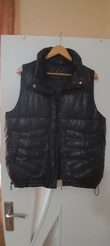 Razmer L/XL.Qara şişmə qadin üçün jilət - Rəng: qara, parlaq səthli - lalafo.az -da Razmer L/XL.Qara şişmə qadin üçün jilət - Rəng: qara, parlaq səthli -