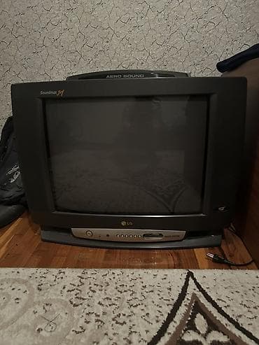 - Televizor: LG markalı kineskop tipli TV. - Ön paneldə mexaniki lalafo.az -da - Televizor: LG markalı kineskop tipli TV. - Ön paneldə mexaniki