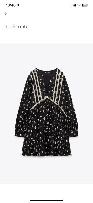 Naxışlı qara rəngli qadın donu. V yaxalıq və uzun qollara malikdir. Ağ lalafo.az -da Naxışlı qara rəngli qadın donu. V yaxalıq və uzun qollara malikdir. Ağ