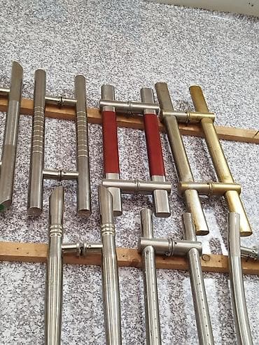 Paslanmayan poladdan və pirinç rəngli materialdan hazırlanmış qapı lalafo.az -da Paslanmayan poladdan və pirinç rəngli materialdan hazırlanmış qapı