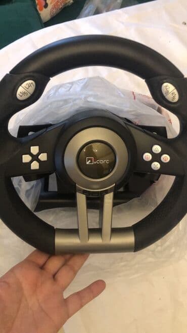 Ucom (uCORC) sükan və pedal dəsti – oyun üçün - Oyun sükanı və iki lalafo.az -da Ucom (uCORC) sükan və pedal dəsti – oyun üçün - Oyun sükanı və iki
