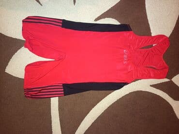 ASICS idman kombinezonu - Rəng: qırmızı, yan panellər qara - Model lalafo.az -da ASICS idman kombinezonu - Rəng: qırmızı, yan panellər qara - Model