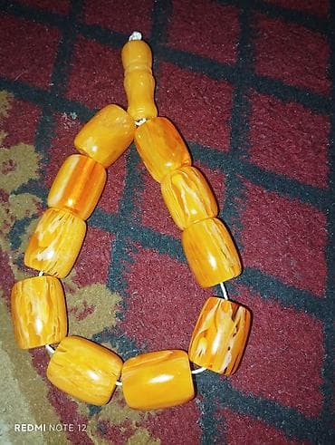 Təmiz mum və kəhraba tozu olan iri dənəli təsbehdir lalafo.az -da Təmiz mum və kəhraba tozu olan iri dənəli təsbehdir