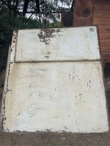 SSR istehsali qalın material qaraj qapisi. 1.80x 2.10 -a. Keyfiyyetli lalafo.az -da SSR istehsali qalın material qaraj qapisi. 1.80x 2.10 -a. Keyfiyyetli