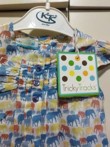 6 aylıq qız uşağına gedir.Fil motivli naxışlarla bəzədilmiş ağ rəngli lalafo.az -da 6 aylıq qız uşağına gedir.Fil motivli naxışlarla bəzədilmiş ağ rəngli