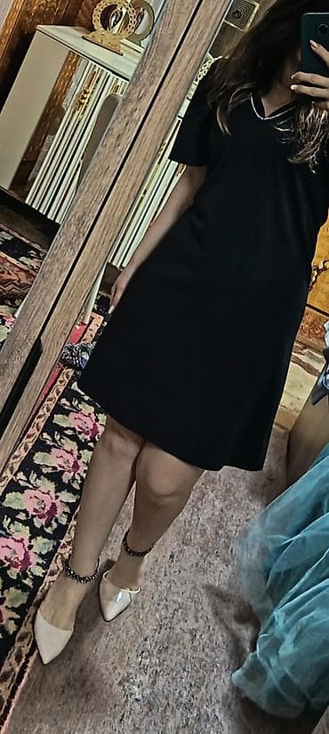 Qara rəngdə zərif qısa don - Stil: Minimalist, düz kəsim; dizə yaxın lalafo.az -da Qara rəngdə zərif qısa don - Stil: Minimalist, düz kəsim; dizə yaxın