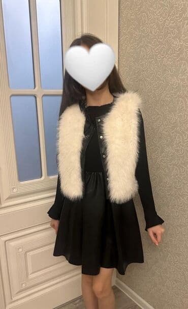 Qız uşaqları üçün şık dəst: - Qara don - Ağ süni kürk jilet 811 yaşa lalafo.az -da Qız uşaqları üçün şık dəst: - Qara don - Ağ süni kürk jilet 811 yaşa