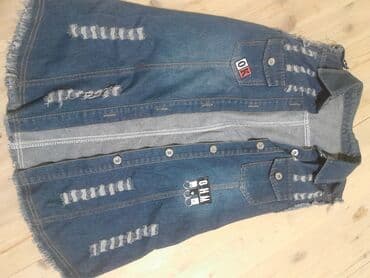 Cins jilet - Material: qalın mavi denim - Dizayn: qolsuz, kenarları lalafo.az -da Cins jilet - Material: qalın mavi denim - Dizayn: qolsuz, kenarları