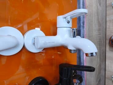 Ağ rəngli divara quraşdırılan qarışdırıcı kran - Material: Metal lalafo.az -da Ağ rəngli divara quraşdırılan qarışdırıcı kran - Material: Metal