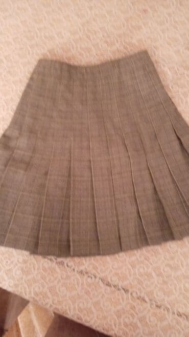 Qəhvəyi-boz tonlarda xalı naxışlı, qısa pliseli ətək. - Klassik lalafo.az -da Qəhvəyi-boz tonlarda xalı naxışlı, qısa pliseli ətək. - Klassik