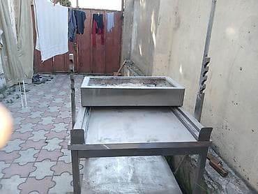 Paslanmayan poladdan manqal və iş masasından ibarət peşəkar şiş-kabab lalafo.az -da Paslanmayan poladdan manqal və iş masasından ibarət peşəkar şiş-kabab