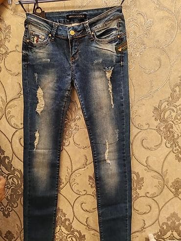 Qadınlar üçün 2 ədəd dar kəsimli cins şalvar seti. 1) Tünd-mavi at lalafo.az Qadınlar üçün 2 ədəd dar kəsimli cins şalvar seti. 1) Tünd-mavi