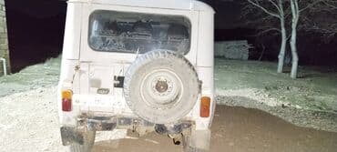 UAZ 469 off-road avtomobili - Korpus: 4 qapılı, ağ rəng. Arxa qapıda lalafo.az -da UAZ 469 off-road avtomobili - Korpus: 4 qapılı, ağ rəng. Arxa qapıda