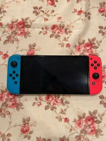 Nintendo Switch OLED oyun konsolu - Model: Nintendo Switch (neon lalafo.az -da Nintendo Switch OLED oyun konsolu - Model: Nintendo Switch (neon