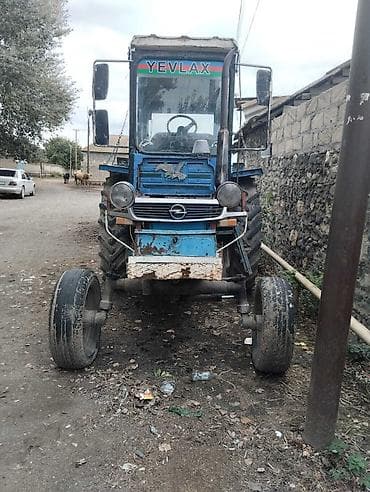 Mavi rəngli traktor, arxa qoşqu çəkmək üçün hazır qurğulu. Kabinli lalafo.az -da — 7 Mavi rəngli traktor, arxa qoşqu çəkmək üçün hazır qurğulu. Kabinli — 7