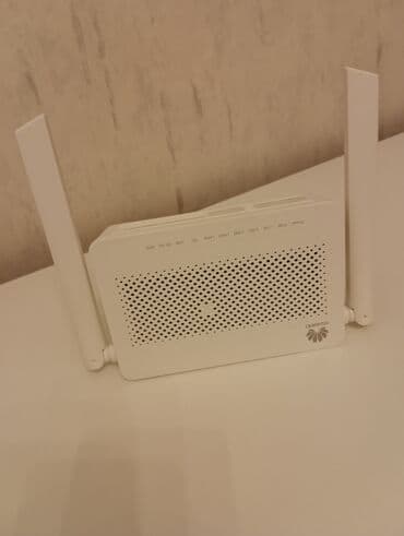Huawei EchoLife HG8145V5 modeli, iki antena ilə təchiz edilmiş ağ lalafo.az -da Huawei EchoLife HG8145V5 modeli, iki antena ilə təchiz edilmiş ağ