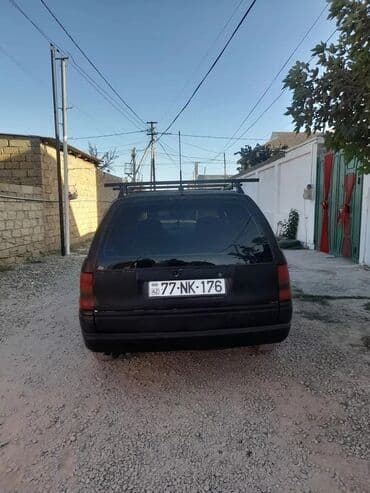 Opel Astra F Universal (kombi) – 5 qapılı, qara rəng. - Kuzov lalafo.az -da Opel Astra F Universal (kombi) – 5 qapılı, qara rəng. - Kuzov