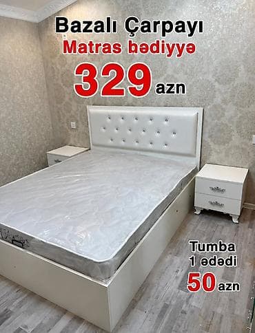 Bazalı çarpayı – zərif ağ rəngdə, yumşaq, düyməli başlıqla. Bazası lalafo.az -da Bazalı çarpayı – zərif ağ rəngdə, yumşaq, düyməli başlıqla. Bazası