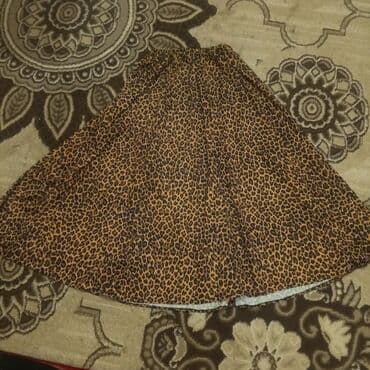 Leopard naxışlı ətək - Model: A-kəsimli, geniş açılan siluet - Beli lalafo.az -da Leopard naxışlı ətək - Model: A-kəsimli, geniş açılan siluet - Beli