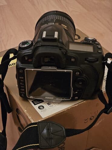 Nikon D90 DSLR fotoaparat + AF-S DX NIKKOR 18-105mm f/3.5-5.6G ED VR lalafo.az -da Nikon D90 DSLR fotoaparat + AF-S DX NIKKOR 18-105mm f/3.5-5.6G ED VR