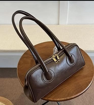 Qadın çantası – uzun formalı, şokolad-qəhvəyi rəngdə real alıcıya lalafo.az -da Qadın çantası – uzun formalı, şokolad-qəhvəyi rəngdə real alıcıya